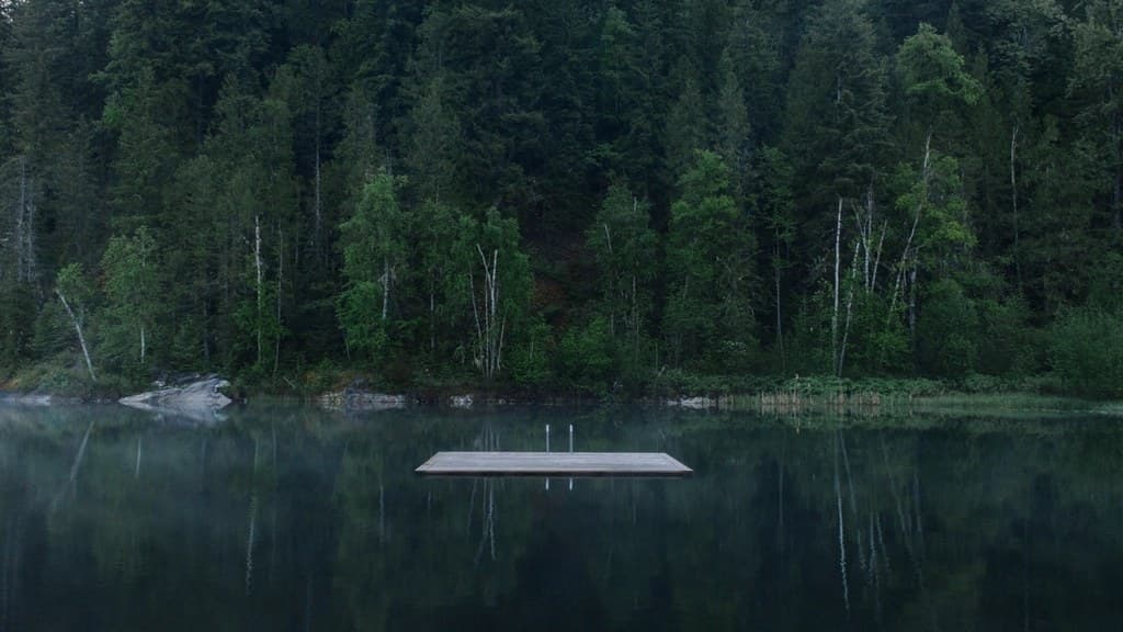 A wooden dock on a calm Minneapolis lake