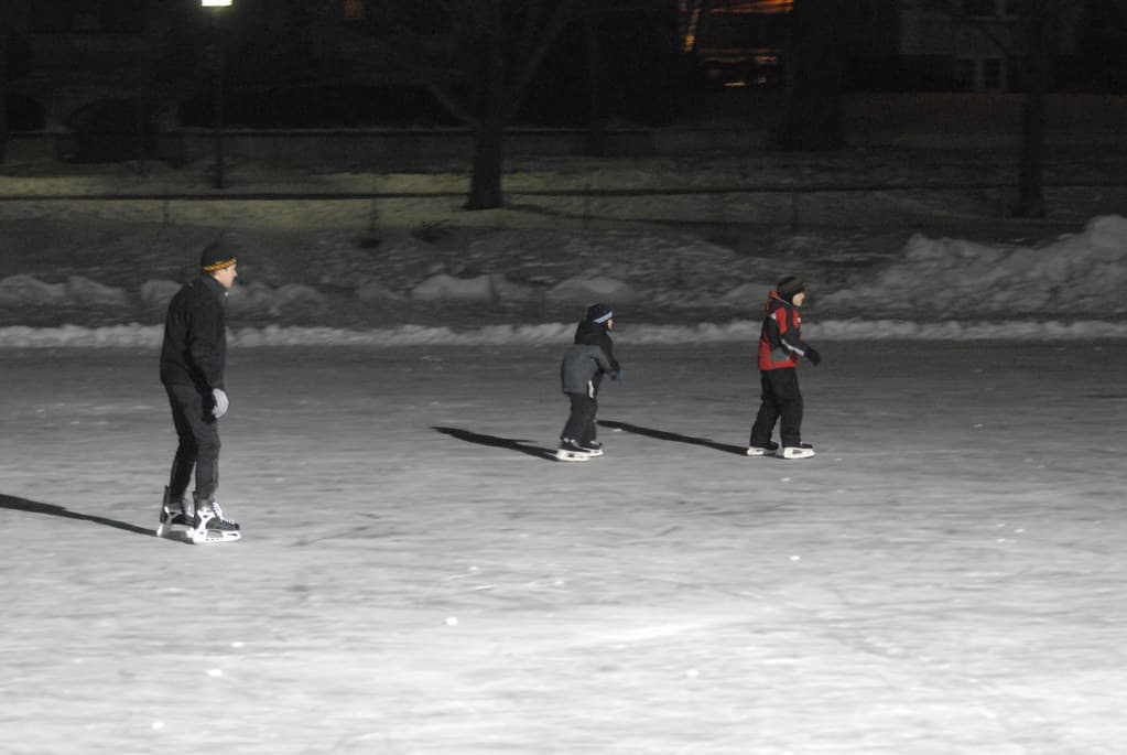 Skaters on the ice at Lake of the Isles in Minneapolis